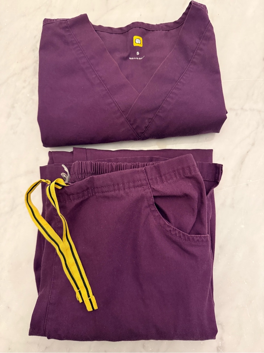 Wink Women's Scrub Set in Deep Plum with Yellow Drawstring